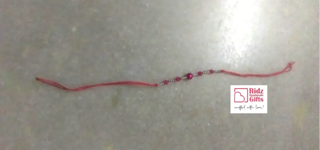 Graceful Bead Rakhi – Crystal Accent Edition