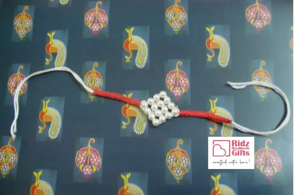 Elegant Pearl Cluster Rakhi