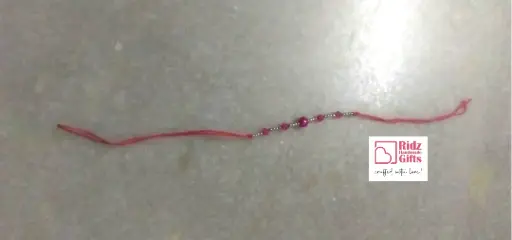 Graceful Bead Rakhi – Crystal Accent Edition